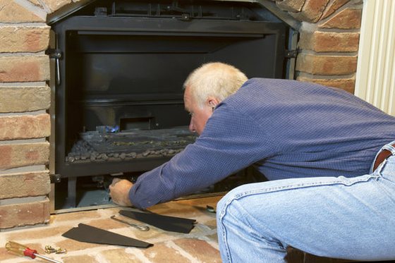 Gas log set pulled for service